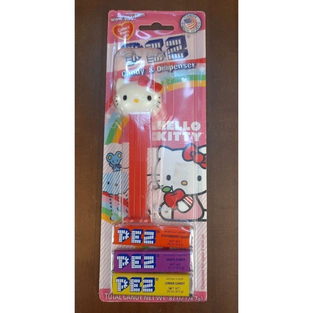 2010 Sanrio Hello‎ Kitty PEZ Dispenser With Red Bow And Red Stem